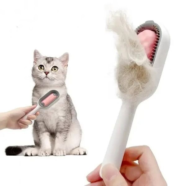 Щетка для вычесывания шерсти домашних животных 4 в 1 Pet Cleaning Comb с массажем и чисткой вещей Pink W28 NNW28 фото